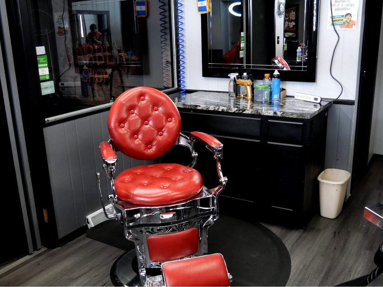 Chrome and red barber chair ready for the next client