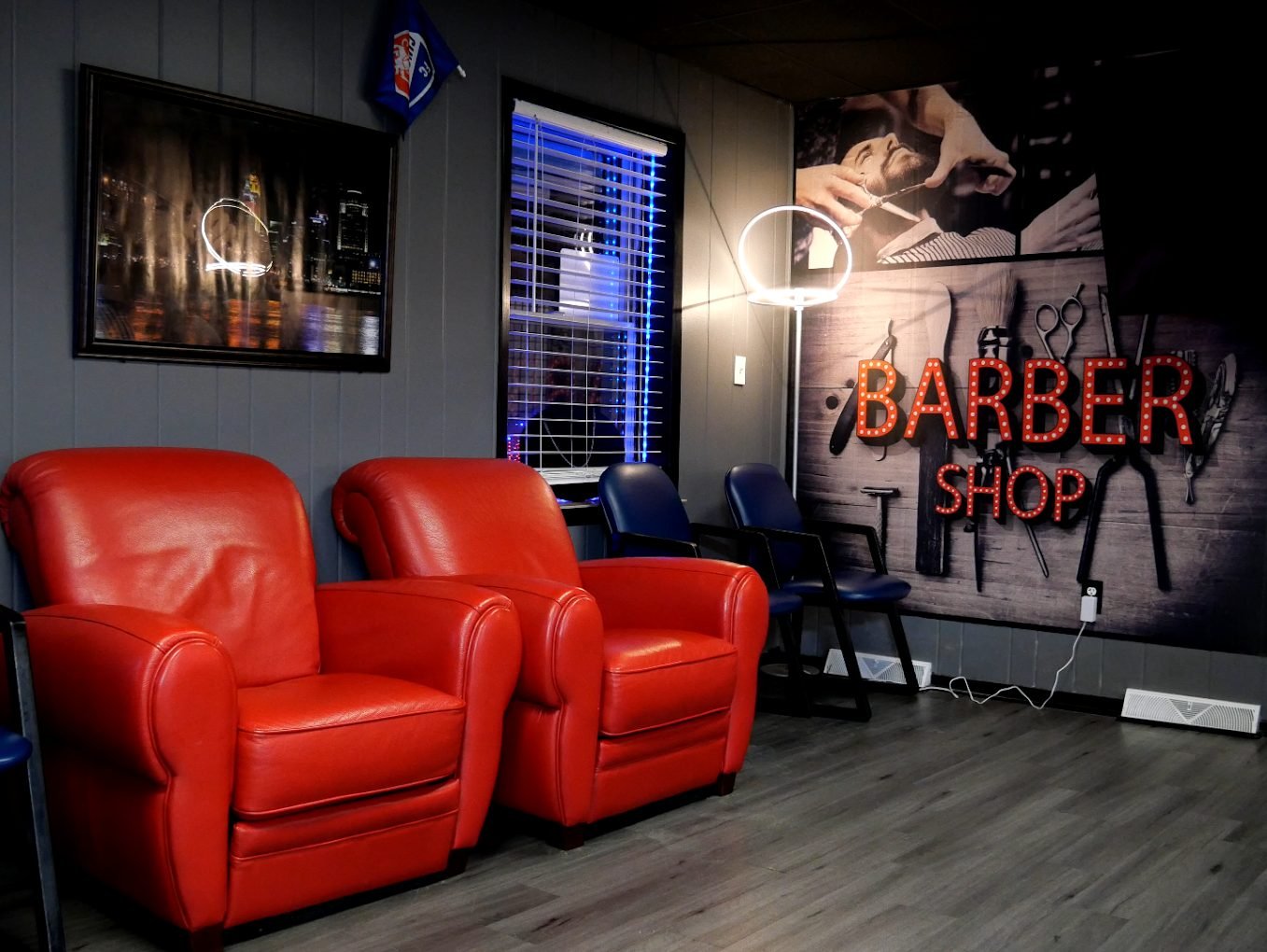 Two red leather lounge chairs in the MVB waiting area